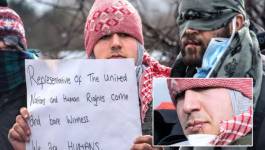 "Jungle" de Calais (France) : des réfugiés iraniens manifestent bouche cousue