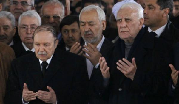 Bouteflika, Ghannouchi et Chadli aux funérailles d'Ahmed Ben Bella